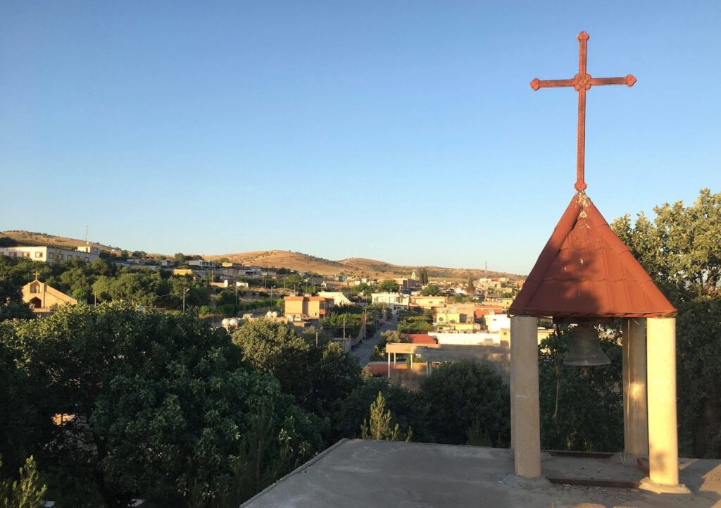 Old bell relocated to Nashmoni cemetery photo by Adeel Hanna